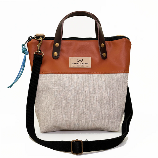 BANDOLERA MINI IMPERMEABLE CON MANILLAS